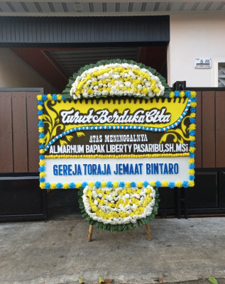 Papan Bunga Duka di Oba Utara
